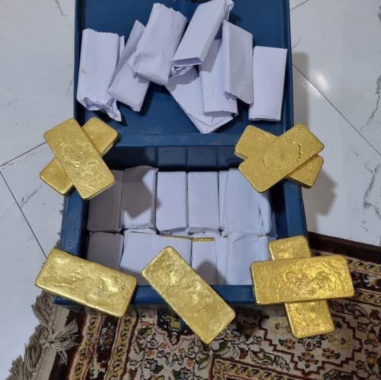 Raw gold nuggets and dore